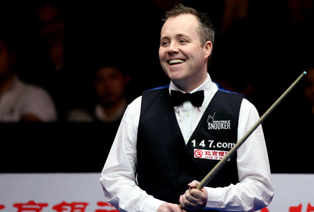 Scotland's John Higgins reacts during the Round 1 match against England's Anthony Hamilton at 2009 World Snooker China Open in Beijing, capital of China, on March 31, 2009. Higgins won 5-4. 