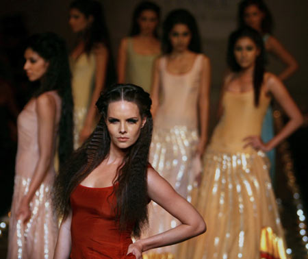 Models present creations by designer Anamika Khanna during the grand finale of Lakme fashion week in Mumbai March 31, 2009.