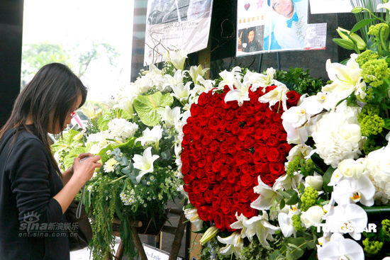 Flowers, photographs, messages with heartfelt words are left outside a hotel in Hong Kong by local and overseas fans of late Hong Kong pop star Leslie Cheung on the sixth anniversary of his death on April 1, 2009. Cheung jumped to death from the hotel six years ago at the age of 46. 