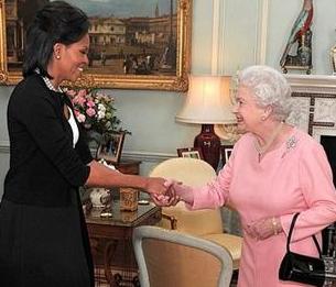 US first lady Michelle Obama is welcomed by Britain's Queen ElizabethII, as she arrives with President Obama for an audience at Buckingham Palace in London, Wednesday April 1, 2009.[John Stillwell/CCTV/AP Photo//Pool] 