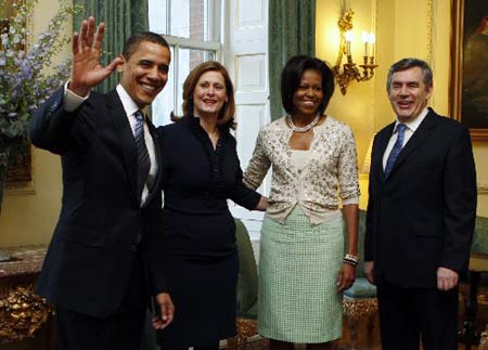 U.S. President Barack Obama (L) and first lady Michelle Obama (2nd R) meet with British Prime Minister Gordon Brown (R) and his wife Sarah at 10 Downing Street in London April 1, 2009. 