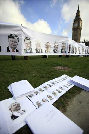 Portraits of leaders of the Group of 20 Countries are seen during a demonstration in London April 1, 2009.