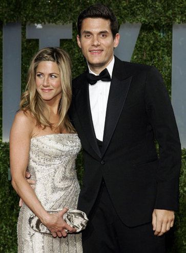 Actress Jennifer Anniston and singer John Mayer pose at the 2009 Vanity Fair Oscar Party in West Hollywood, California February 22, 2009. 