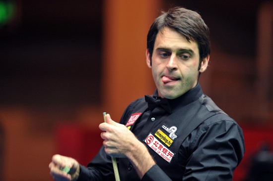 Ronnie O'Sullivan survived a tough outing against China's Xiao Guodong last night to set up an enticing quarterfinal clash with John Higgins at the China Open in Beijing. [Xinhua]