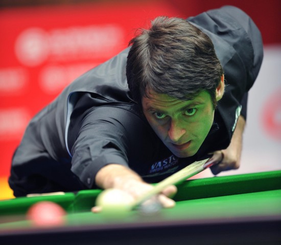 Ronnie O'Sullivan survived a tough outing against China's Xiao Guodong last night to set up an enticing quarterfinal clash with John Higgins at the China Open in Beijing. [Xinhua] 