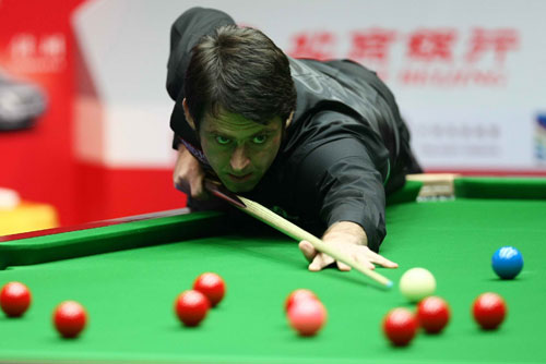  Ronnie O'Sullivan survived a tough outing against China's Xiao Guodong last night to set up an enticing quarterfinal clash with John Higgins at the China Open in Beijing. [Sina.com]