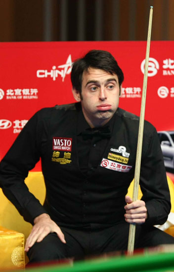 Ronnie O'Sullivan survived a tough outing against China's Xiao Guodong last night to set up an enticing quarterfinal clash with John Higgins at the China Open in Beijing. [Sina.com]