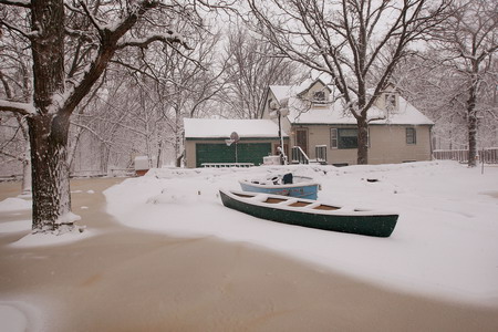 Snowstorm slows Fargo's recovery from flood