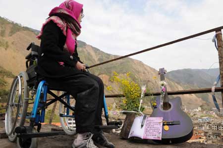 A woman mourns her child killed during the devastating earthquake striking southwest China's Sichuan Province May 12, 2008, in Beichuan County, southwest China's Sichuan Province, April 4, 2009.