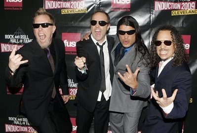 Metallica members James Hatfield, left, Lars Ulrich, Robert Trujillo and Kirk Hammett arrive on the red carpet for the 2009 Rock and Roll Hall of Fame Induction Ceremony Saturday, April 4, 2009 in Cleveland. 