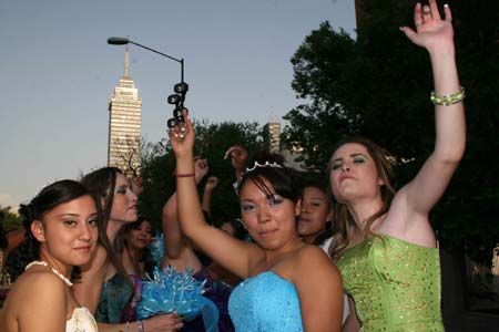 Over 300 15-year-old girls celebrate their birthdays together on the Constitution Square of Mexico City, capital of Mexico, April 4, 2009. During this special birthday party, these teenager girls danced and ate a huge birthday cake together. (Xinhua/Arturo)