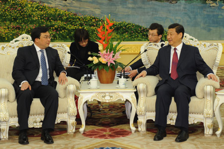 Chinese Vice President Xi Jinping (R) meets with visiting Kyrgyz Foreign Minister Kadyrbek Sarbaev in Beijing, capital of China, on April 7, 2009. (Xinhua/Li Xueren)