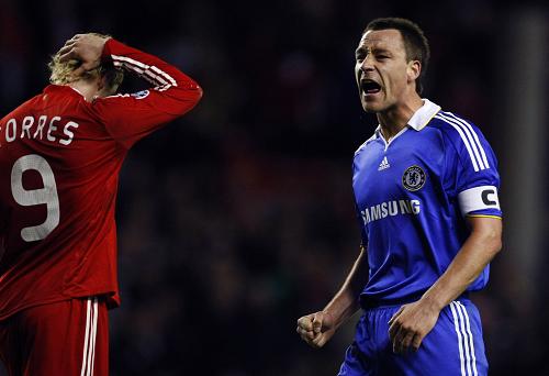 Chelsea's John Terry (R) celebrates after their Champions League soccer match against Liverpool in Liverpool, northern England April 8, 2009.(Xinhua/Reuters Photo) 