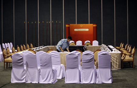 A worker prepares a meeting room for the 14th ASEAN Summit and related summits in Pattaya April 8, 2009.