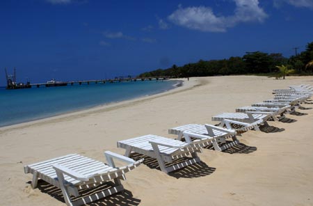 Empty beach chairs are seen on the beach in the Autonomous Region of the South Atlantic (RAAS), Nigaragua, April 8, 2009, during the Holly Week holidays, as the global economic crisis affected the tourism here. (Xinhua/Cesar Perez)