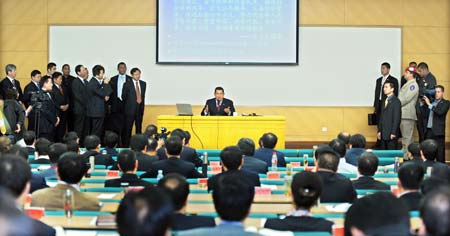 Venezuelan President Hugo Chavez speaks during his visit to the Party School of the Central Committee of the Communist Party of China (CPC), in Beijing on April 9, 2009. (Xinhua/Xie Huanchi) 