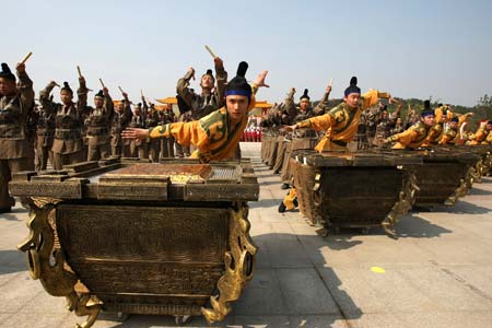 Actors rehearse the opening ceremony of 2009 China Wu Culture Festival held in Wuxi City, east China's Jiangsu Province, April 8, 2009. The 2009 China Wu Culture Festival will kick off in Wuxi on April 10. As a famous city with a history of 3000 years and the site of the old Wu Kingdom, Wuxi is known for its rich Wu culture. (Xinhua/Huan Wei)