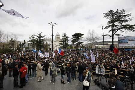 Thousands of Georgians hold a rally against Georgian President Mikheil Saakashvili, calling on his resignation, in front of Parliament Building in Tbilisi, capital of Georgia, April 9, 2009. (Xinhua/Lu Jinbo)