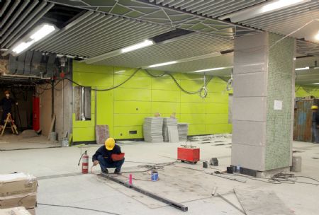 A worker works at the construction site of Xisi Station of the No. 4 Subway Line in Beijing, capital of China, April 8, 2009. The construction of the new subway line is well under way. (Xinhua/Li Fangyi)