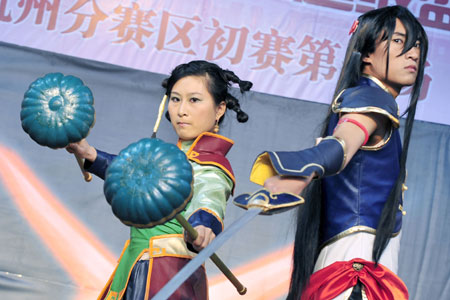 Devotees of Cosplay perform during a preliminary contest of the China COSPLAY Super Show held in Hangzhou, east China's Zhejiang Province, April 12, 2009. [Li Zhong/Xinhua]