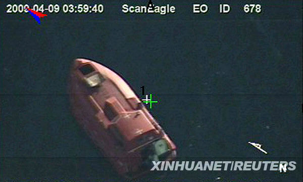 This image provided by the U.S. Navy taken from video made with an unmanned aerial vehicle shows a 28-foot lifeboat from the U.S.-flagged container ship Maersk Alabama on Thursday, April 9, 2009 in the Indian Ocean. According to the Navy, the cargo ship's Capt. Richard Phillips was being held by Somali pirates aboard the lifeboat when this video was made. [Xinhua/Reuters]