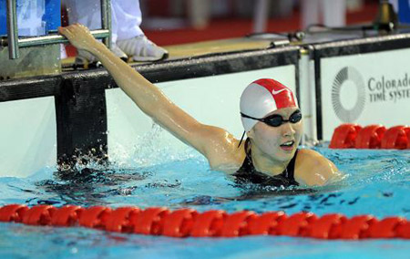 Olympic silver winner Jiao Liuyang completed her triple victory after she set an Asian record in the 50 meters butterfly adding to her 100 and 200 meters titles at the Chinese national swimming championships on Saturday.(Xinhua/Xu Yu