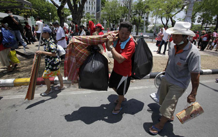 Thai Prime Minister Abhisit Vejjajiva said on Tuesday afternoon the tension caused by anti-government protesters has been eased, and the retreat of the red-shirted people does not mean a victory or loss of any side, but a victory of society, since normalcy has returned.