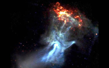A photo of Pulsar B1509 taken by NASA's Chandra X-ray observatory. It looks like a hand of God reaching out into the cosmos, but NASA says the display is caused by a young and powerful pulsar.[NASA]
