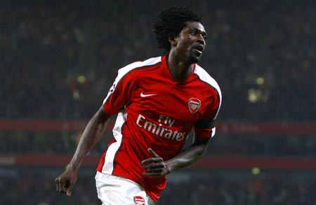 Arsenal's Emmanuel Adebayor celebrates after scoring against Villarreal during their Champions League quarter-final, second leg soccer match at the Emirates stadium in London April 15, 2009.