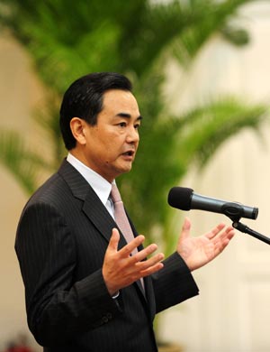 State Council Taiwan Affairs Office Director Wang Yi speaks at the welcoming cocktail party in Boao, south China&apos;s Hainan Province, April 17, 2009. Wang Yi met here with Fredrick Chien, who led a Taiwanese delegation to the Boao Forum for Asia (BFA) Annual Conference 2009 which kicked off here on Friday. (Xinhua/Zhao Yingquan)