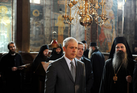 Serbian President Boris Tadic (C) visits the 14th-century Orthodox monastery in Decani of Kosovo to mark the Orthodox Good Friday April 17, 2009. Tadic paid a landmark visit to Kosovo on Friday and called for peace after the Kosovo government agreed to the visit as suggested by international officials. (Xinhua/Astrit Ibrahimi)