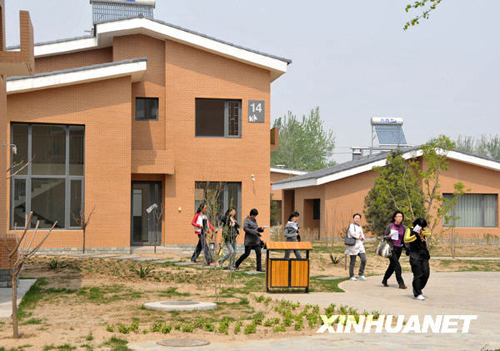 Photo taken on April 17, 2009 shows a flat inside the Beijing SOS Children's Village, in Daxing district, Beijing. The Village, the 10th in China, co-sponsored by the Beijing government and SOS Kinderdorf International (SOS KDI) and set to open in July, will house up to 120 orphans aged 4 to 12 chosen by local civil affairs bureaus in Beijing and other parts of the country.