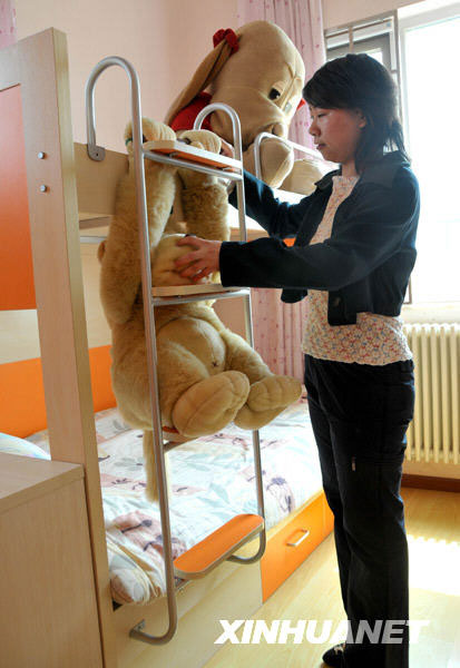 Photo taken on April 17, 2009 shows a flat inside the Beijing SOS Children's Village, in Daxing district, Beijing. The Village, the 10th in China, co-sponsored by the Beijing government and SOS Kinderdorf International (SOS KDI) and set to open in July, will house up to 120 orphans aged 4 to 12 chosen by local civil affairs bureaus in Beijing and other parts of the country.