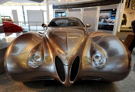 Photo taken on April 14, 2009 shows the 1941 Chrysler Newport on display in Walter P. Chrysler Museum in Detroit, the United States. Visitors to the museum could experience the saga of the time-honored Chrysler LLC from its vehicle collection, historical photographs, advertisements and footage. [Gu Xinrong/Xinhua]