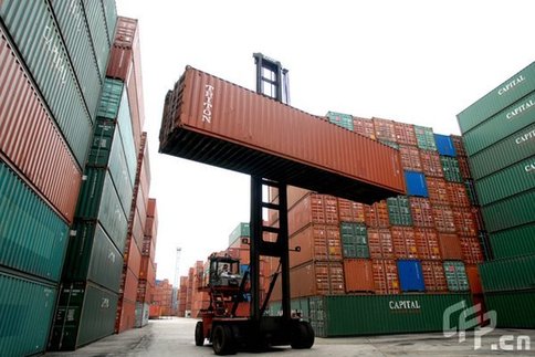 Triton containers are seen being moved at Container System Ltd, in Lau Fau Shan Hong Kong, China [CFP]