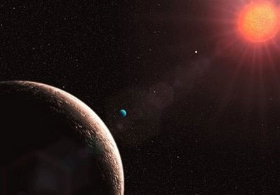 An artist's impression of 'Planet e' , forground left, released by the European Organisation for Astronomical Research in the Southern Hemisphere Tuesday April 21, 2009. 