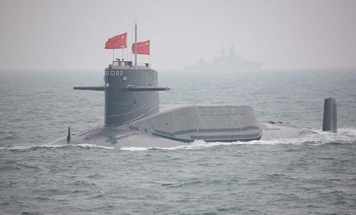 A nuclear submarine of the Chinese People's Liberation Army (PLA) Navy is seen during a naval parade of the PLA Navy warships and aircraft in waters off China's port city of Qingdao, east China's Shandong Province, on April 23, 2009. [Li Gang/Xinhua]