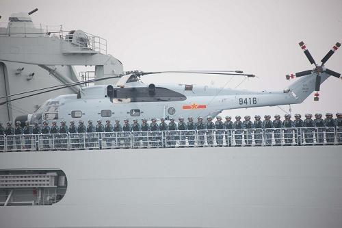 A naval parade of the Chinese People's Liberation Army (PLA) Navy warships and aircraft is held in waters off China's port city of Qingdao, east China's Shandong Province, on April 23, 2009. 