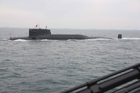 A nuclear submarine of the Chinese People's Liberation Army (PLA) Navy is seen during a naval parade of the PLA Navy warships and aircraft in waters off China's port city of Qingdao, east China's Shandong Province, on April 23, 2009. (Xinhua/Li Gang)