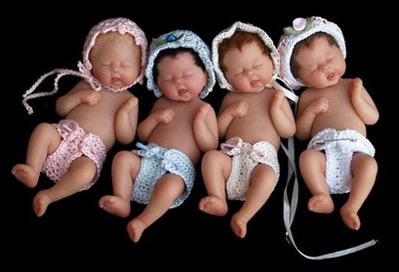  These little arrivals are so lifelike and appealing that they have captured hearts around the world. The babies, from just over an inch to 4in high, are the work of artist Camille Allen, who sculpts them from polymer clay using dentist's tools and toothpicks. [China Daily]