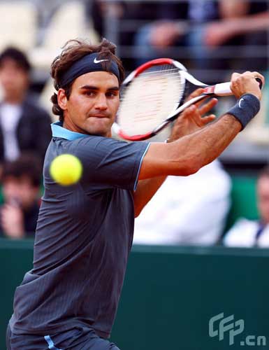 Roger Federer of Switzerland in action against Potito Starace of Italy during a charity match in memory of Federico Luzzi of Italy who died of leukemia last year during previews for the Foro Italico Tennis Masters on April 26, 2009 in Rome, Italy.
