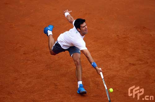 Novak Djorkovic of Serbia plays tennis with Andreas Seppi of Italy in memory of Luzzi Federico of Italy who died with leukemia last year during previews for the Foro Italico Tennis Masters on April 26, 2009 in Rome, Italy.