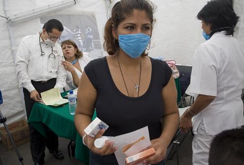 Medical service stations are built on the streets of Mexico City to provide free physical check for people to prevent the spread of swine flu. 