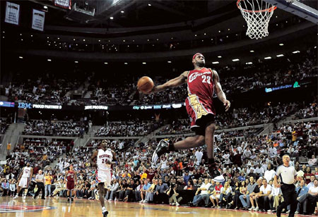 LeBron James of the Cleveland Cavaliers lines up for a first quarter break-away dunk in front of Antonio McDyess (24) of the Detroit Pistons in Game Four of the Eastern Conference Quarterfinals during the 2009 NBA Playoffs at the Palace of Auburn Hills on Sunday in Auburn Hills, Michigan. [AP]