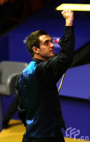 Mark Selby of England celebrates winning his game against Graeme Dott of Scotland during the 2nd Round of the Betfred World Snooker Championships at the Crucible Theatre on April 27, 2009 in Sheffield, England. 