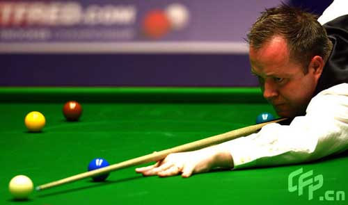 John Higgins of Scotland lines up a shot in his match against Jamie Cope of England during the 2nd Round of the Betfred World Snooker Championships at the Crucible Theatre on April 27, 2009, in Sheffield, United Kingdom.