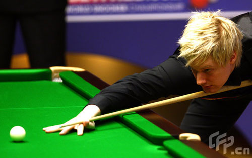 Neil Robertson of Australia takes a shot on his way to winning his match against Ali Carter of England during the 2nd Round of the Betfred World Snooker Championships at the Crucible Theatre, on April 27, 2009 in Sheffield, in United Kingdom.
