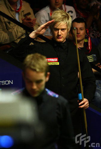 Neil Robertson of Australia salutes his opponent after winning his match against Ali Carter of England during the 2nd Round of the Betfred World Snooker Championships at the Crucible Theatre, on April 27, 2009 in Sheffield, in United Kingdom.