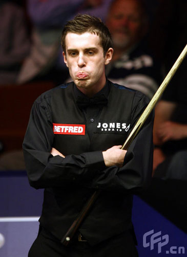 Mark Selby in action against Graeme Dott during the Betfred.com World Snooker Championship at The Crucible Theatre, Sheffield.