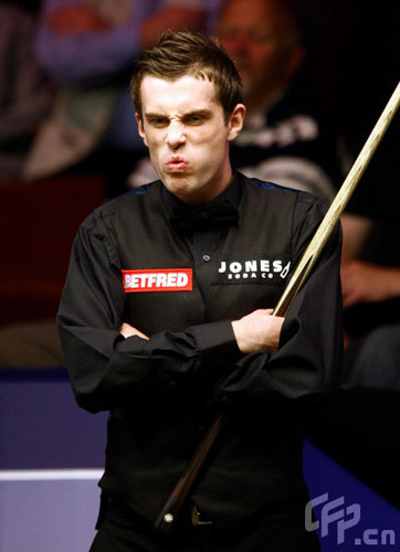 Mark Selby in action against Graeme Dott during the Betfred.com World Snooker Championship at The Crucible Theatre, Sheffield.